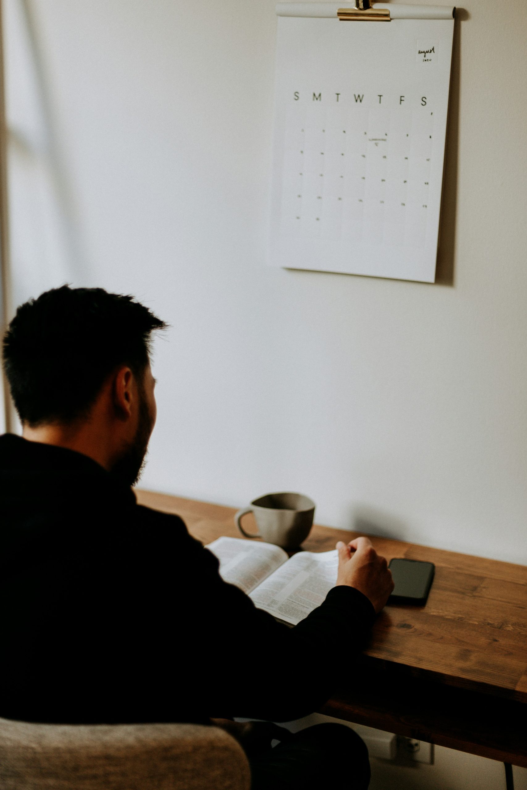 Curious person reading a book photo by priscilla preez at Unsplash